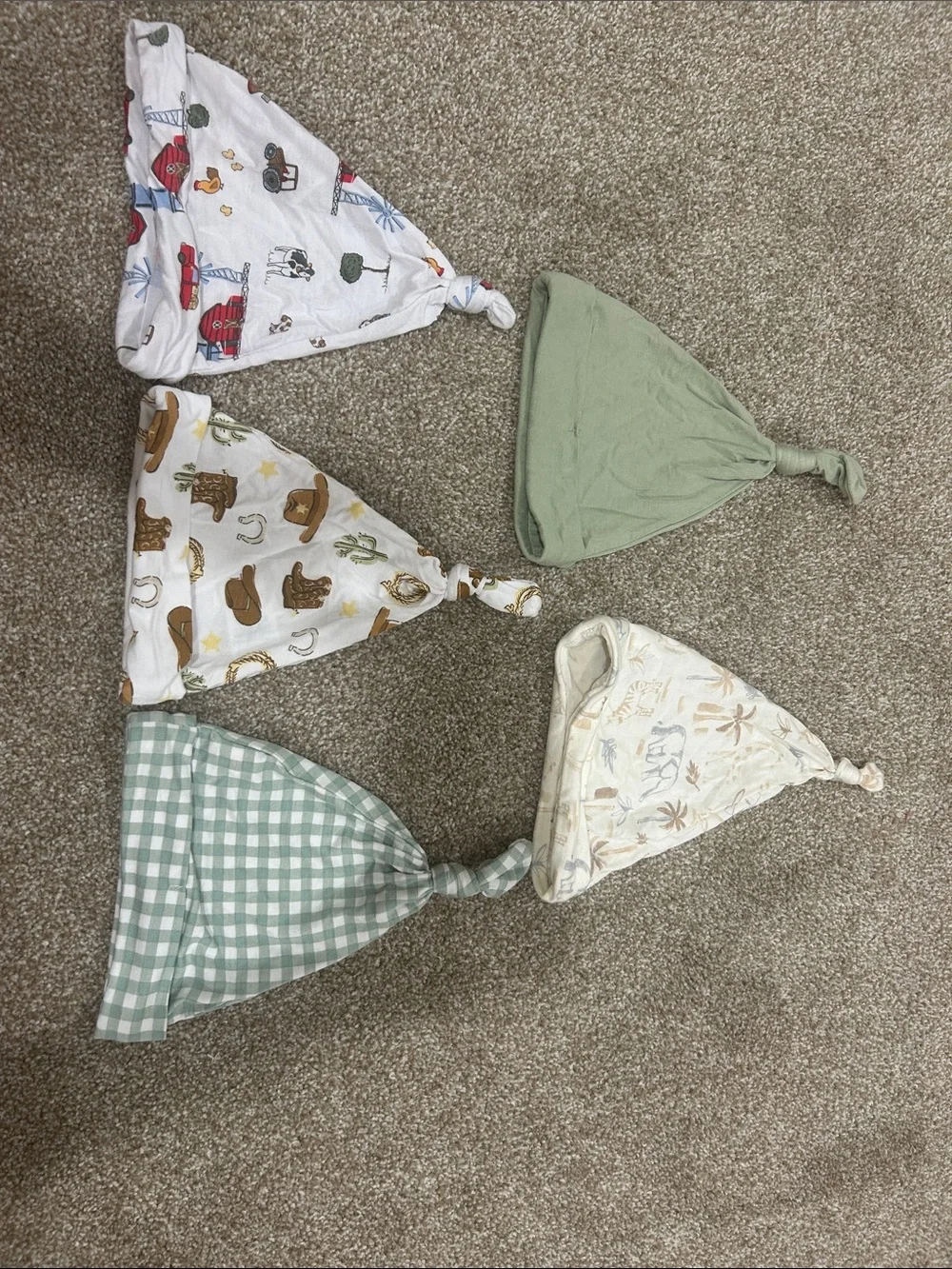 Bundle of baby beanie top knot hats